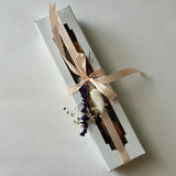 Small gift box with assorted fruit chips mix in carob chocolate and isomalt tea bombs