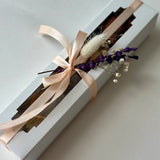 Small gift box with assorted fruit chips mix in carob chocolate and isomalt tea bombs